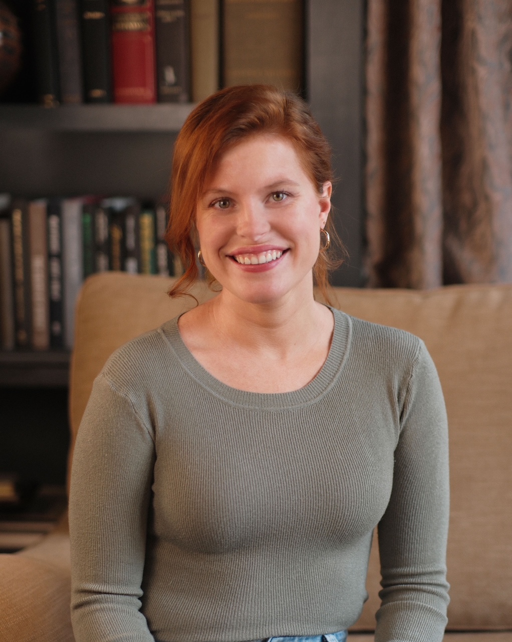 A professional portrait of Abby.